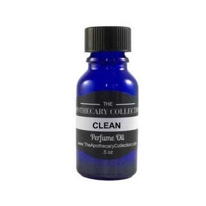 May include: A small blue glass bottle with a black cap. The bottle is labeled "The Apothecary Collection" and "Clean Perfume Oil". The bottle contains 5 oz of perfume oil.