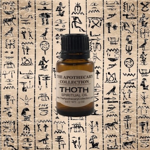 May include: A brown glass bottle with a black cap and a white label. The label reads "The Apothecary Collection" and "Thoth Spiritual Oil". The bottle is sitting on a background of black and white hieroglyphics.