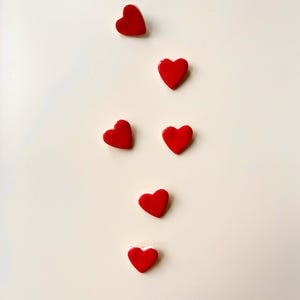 porcelain brooch with red enamel heart
