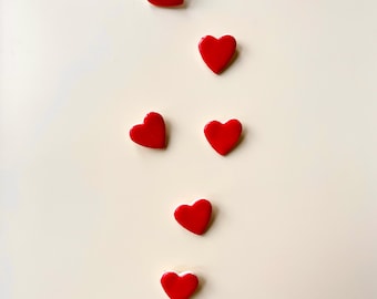 porcelain brooch with red enamel heart
