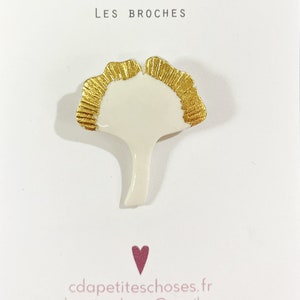 porcelain ginkgo leaf brooch with cracked white enamel and gold leaf