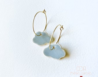 Creole earrings with small gray blue porcelain clouds