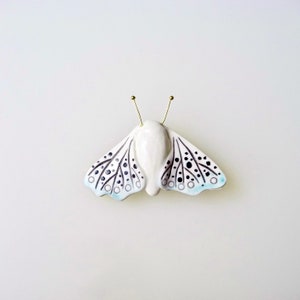 White and blue moth porcelain brooch
