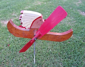 Dandy 1950s Indian Chief in Canoe Paddling Whirligig