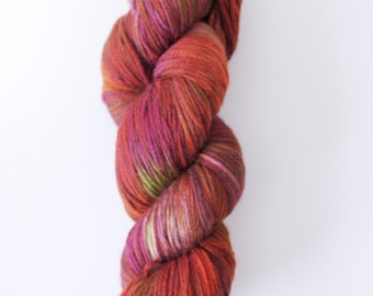 Superwash Merino Yarn . DK . Hand Dyed . 243 yards . Wild Lilac Moon's Starlight in "Kaleidoscope" . Rust . Purple . Pink