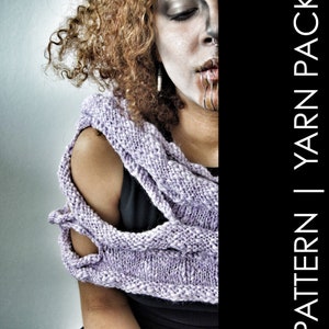 May include: A purple knitted cowl with a unique openwork design. The cowl is worn by a person with curly hair and dark makeup. The text "PATTERN | YARN PACK" is visible on the right side of the image.