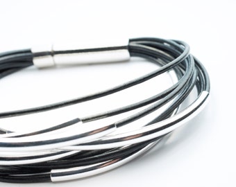 Multi Strand Black Leather Bracelet . Sterling Silver Tubes . Stainless Steel Closure . Rustic .