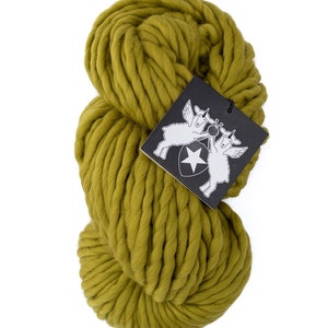 May include: A skein of chunky, olive green yarn. The yarn is made of wool and is perfect for knitting or crocheting.