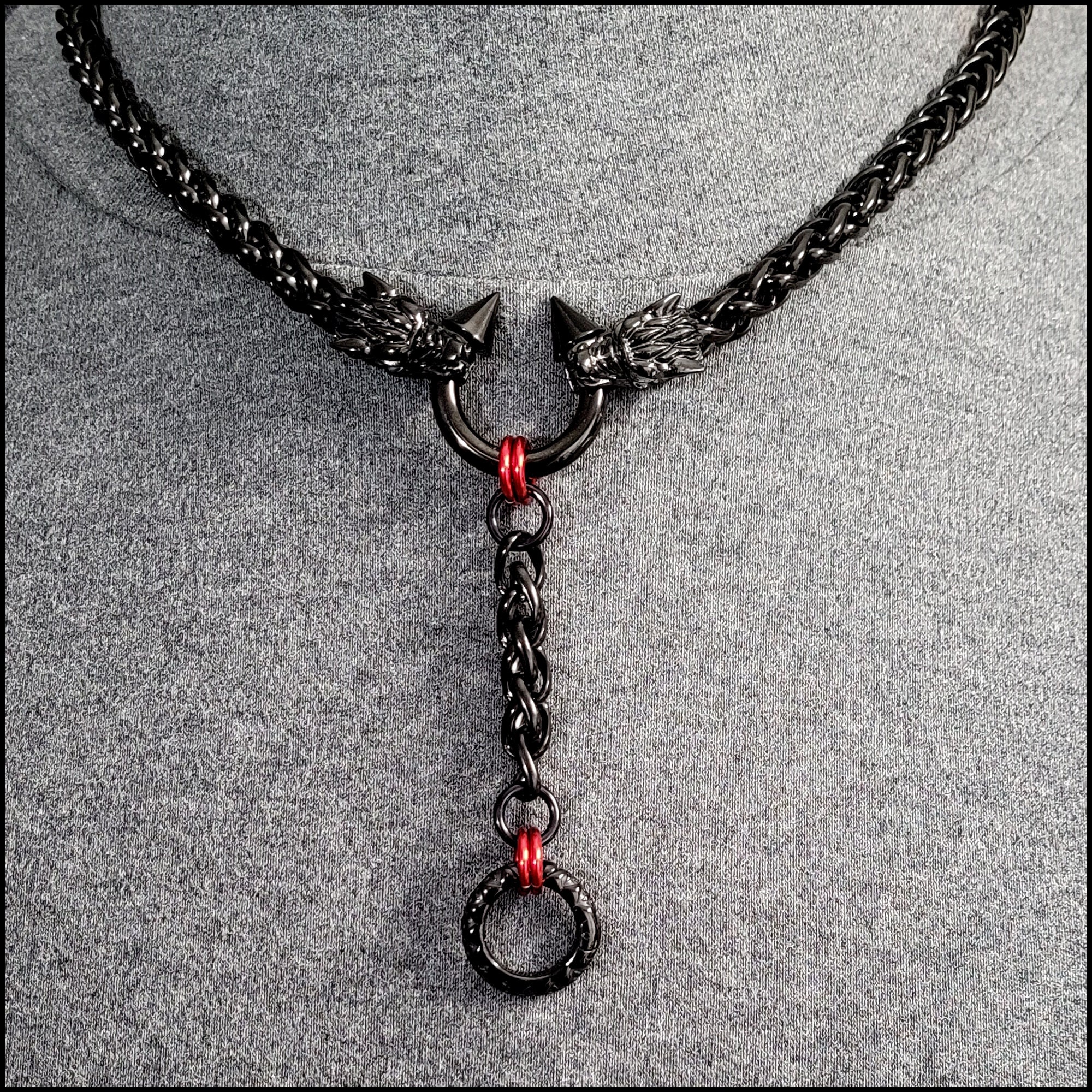 Black string necklace with a steel pendant - big shiny grain