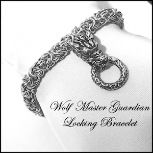 May include: A silver wolf head bracelet with a locking clasp. The bracelet is made of a woven metal chain and features a detailed wolf head design. The text "Wolf Master Guardian Locking Bracelet" is printed below the bracelet.