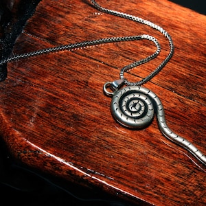 Hill tribe swirl pendant