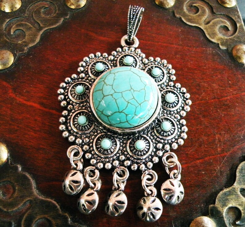 Tibetan turquoise sun pendant Himalayan jewelry Etsy