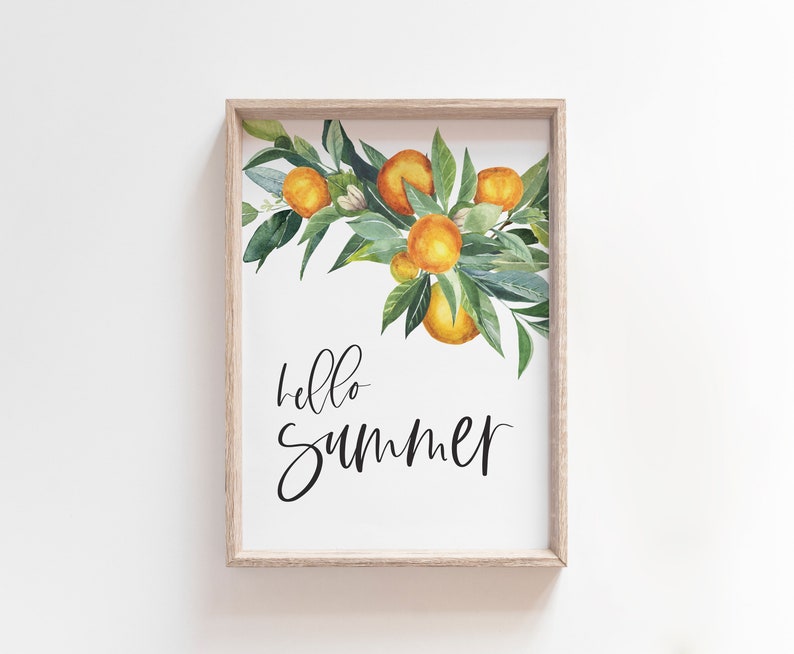 May include: A framed print featuring a watercolour illustration of a branch of orange blossoms and the text "hello summer" in black script.