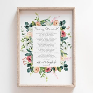 May include: A watercolour print with a floral border featuring a poem titled "This is my father's world". The poem is written in white text on a white background. The floral border is made up of pink, white, and green flowers.