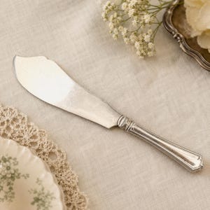 Cuchillo para servir pescado Oneida Community Exeter, chapado en plata, 27,5 cm, c. 1910-1920.