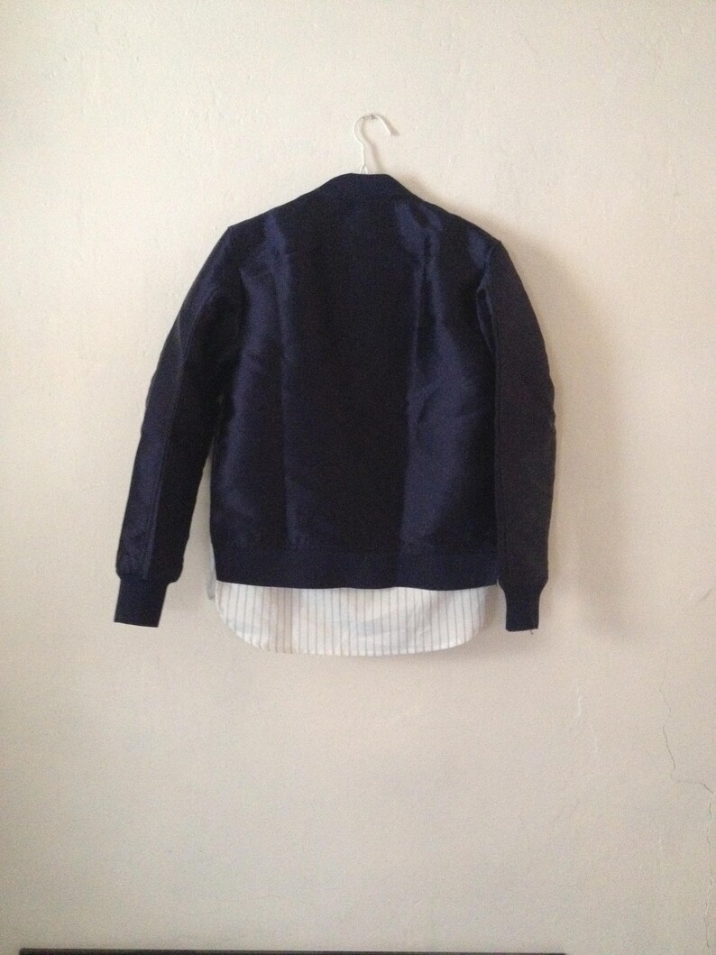 Dark Navy Blue Shiny Bomber Jacket Striped Shirt Lining Silver Zips Minimal Trend