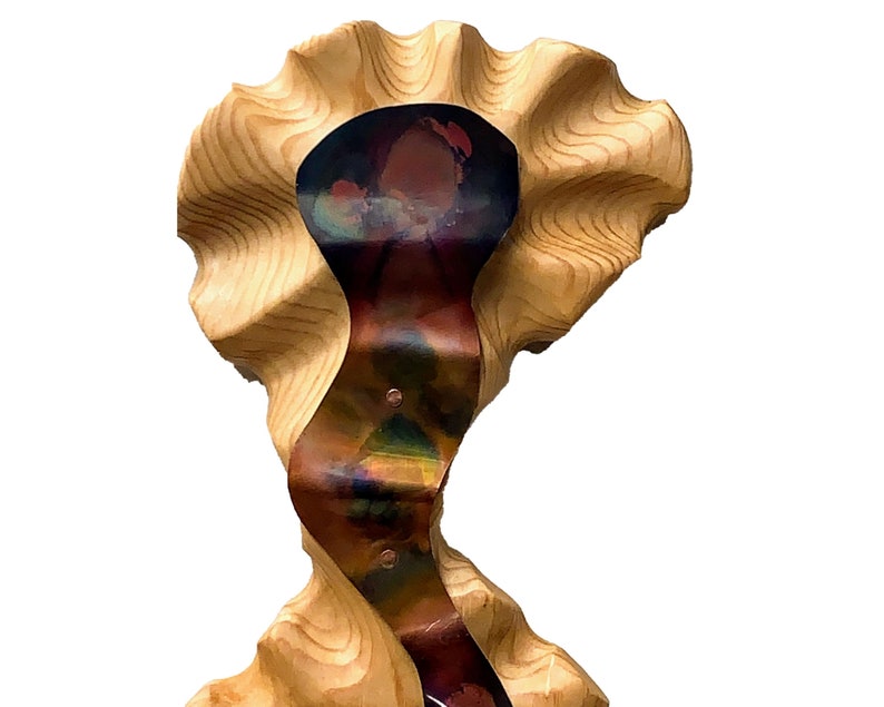 May include: A wooden sculpture with a wavy, organic shape. The sculpture is painted in shades of brown, copper, and iridescent colors. The top of the sculpture is shaped like a flower.