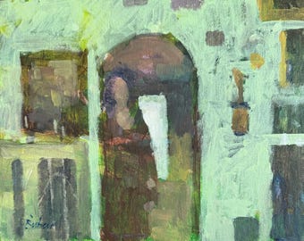 May include: An oil painting on canvas featuring a pale mint green building facade with a dark arched doorway. The textured brushstrokes depict a central dark brown figure standing in the entrance, with a white vertical shape and a signature in the corner.
