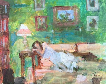 May include: An oil painting depicting a figure in a light-colored garment resting on a sofa in a room with green walls. A lamp with a pink shade sits on a small table nearby. Several framed pictures hang on the wall, and the artist's signature is visible.