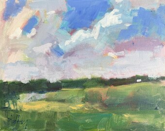 May include: An oil painting on canvas depicting a landscape with a vibrant blue sky filled with thick, textured white and lavender clouds above a horizon line of dark green trees and a foreground of grassy fields in shades of green and yellow.