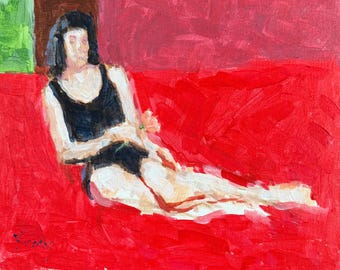 May include: An oil painting on canvas depicting a figure with dark hair wearing a black tank top, reclining on a vibrant red surface. The figure holds a small pink flower in their hand. The background features a solid red wall and a green area.