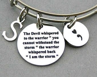 The Devil whispered to the warrior "you cannot withstand the storm" and the warrior whispers back "I am the storm" Bangle, Awareness Jewelry