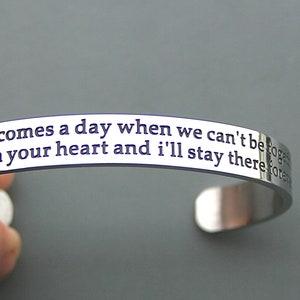 May include: Silver bracelet with an engraved message: "Never comes a day when we can't be together. I'll be in your heart and I'll stay there forever."