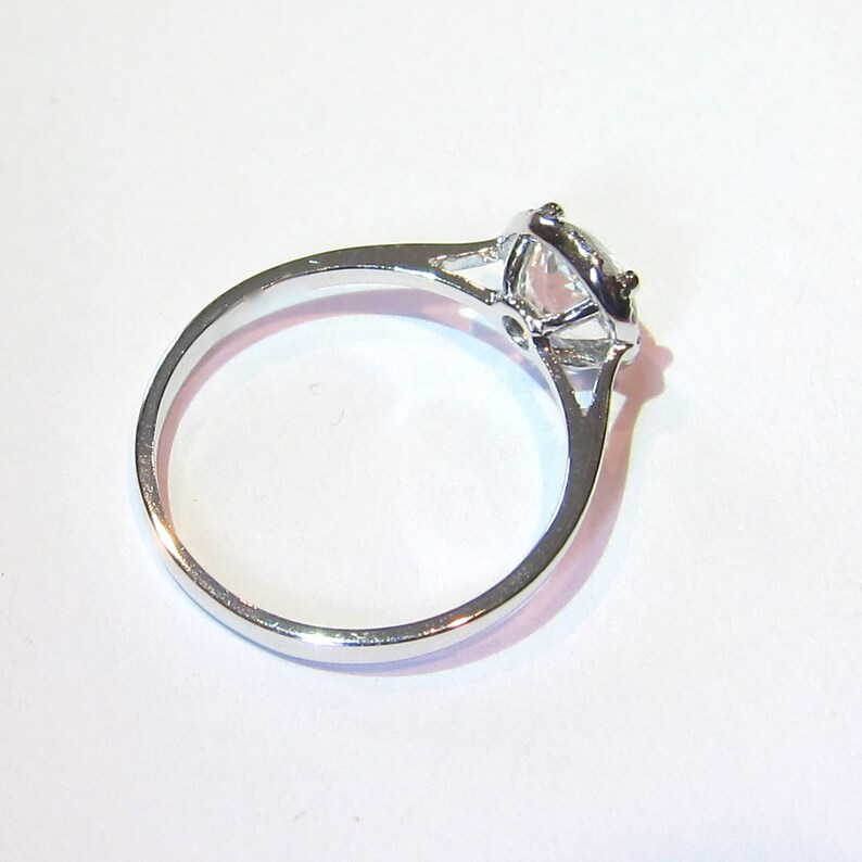 14k White Gold White Topaz Gemstone Ring with Diamond Halo