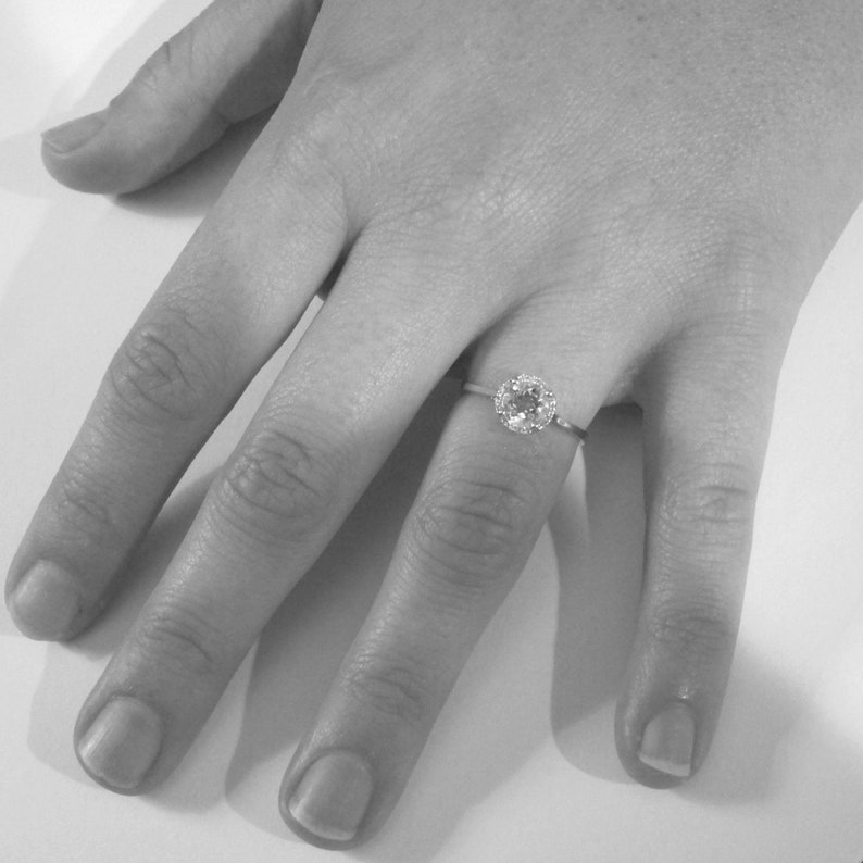 14k White Gold White Topaz Gemstone Ring with Diamond Halo
