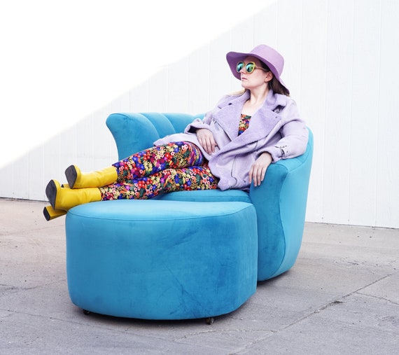 Turquoise Upholstered Curved Channel Back Chair and Ottoman