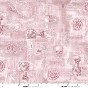 May include: A light pink fabric featuring a repeating pattern of skulls, skeletal rib cages, hands, spiders, and roses layered over a background of vintage-style cursive script text. The design includes a visible ruler along the bottom edge.
