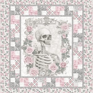 May include: A quilt featuring a central image of a human skeleton surrounded by pink roses and a decorative frame. The quilt has a floral border and a patchwork design with gray and pink plaid accents. The overall color scheme is soft and muted.