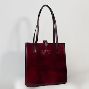 Burgundy patent leather Cartier Happy Birthday Bag