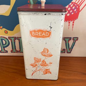 May include: A set of three ceramic mugs with a speckled, matte finish. The mugs are in shades of cream, light gray, and dark gray. Each mug has a simple, minimalist design, perfect for coffee or tea.