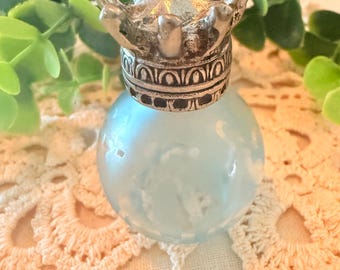Vintage aqua blue glass perfume bottle with silver crown
