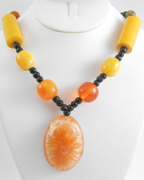 Large statement necklace featuring Molded plastic… - image 2