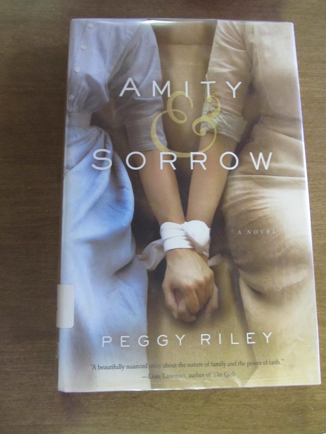 Amity & Sorrow Book Amity and Sorrow Peggy Riley Hardcover Coffee Table ...