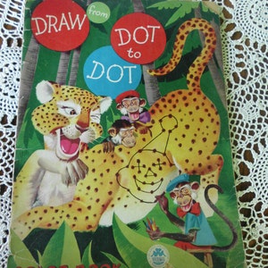 May include: A vintage children's coloring book titled "Draw from Dot to Dot Color Book" featuring a cartoon leopard with three monkeys. The cover is illustrated with a jungle scene.
