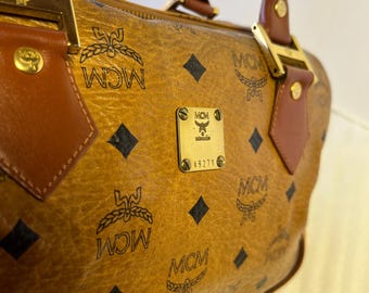 MCM  Boston Cignac Visetos Satchel MCM Handbag Top Handle Bag Cognac Visetos 2 way bag Top handle Wide Crossbody Shoulder Bag Strap
