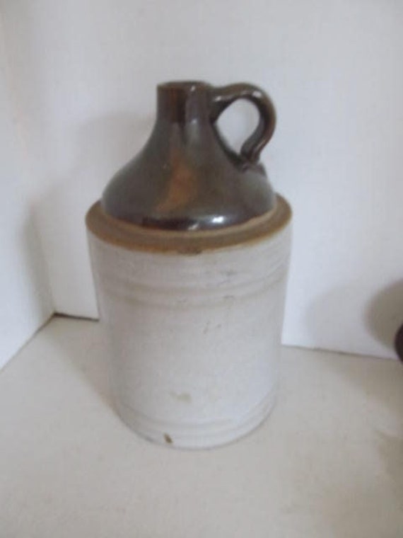 Primitive Moonshine Jug Button Tin Sign Primitive Moonshine Jug Button Tin Sign
