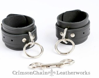 Black unlined bondage cuffs by Crimson Chain Leatherworks