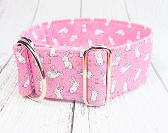 May include: Pink dog collar with a white bunny and carrot print and gold metal hardware.