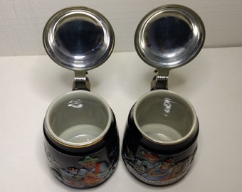 Pair of German Beer Steins with Matching Inscribed lids