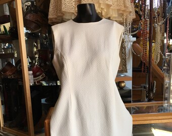 White Sleeveless Dress with Ruffle along Bottom Lined