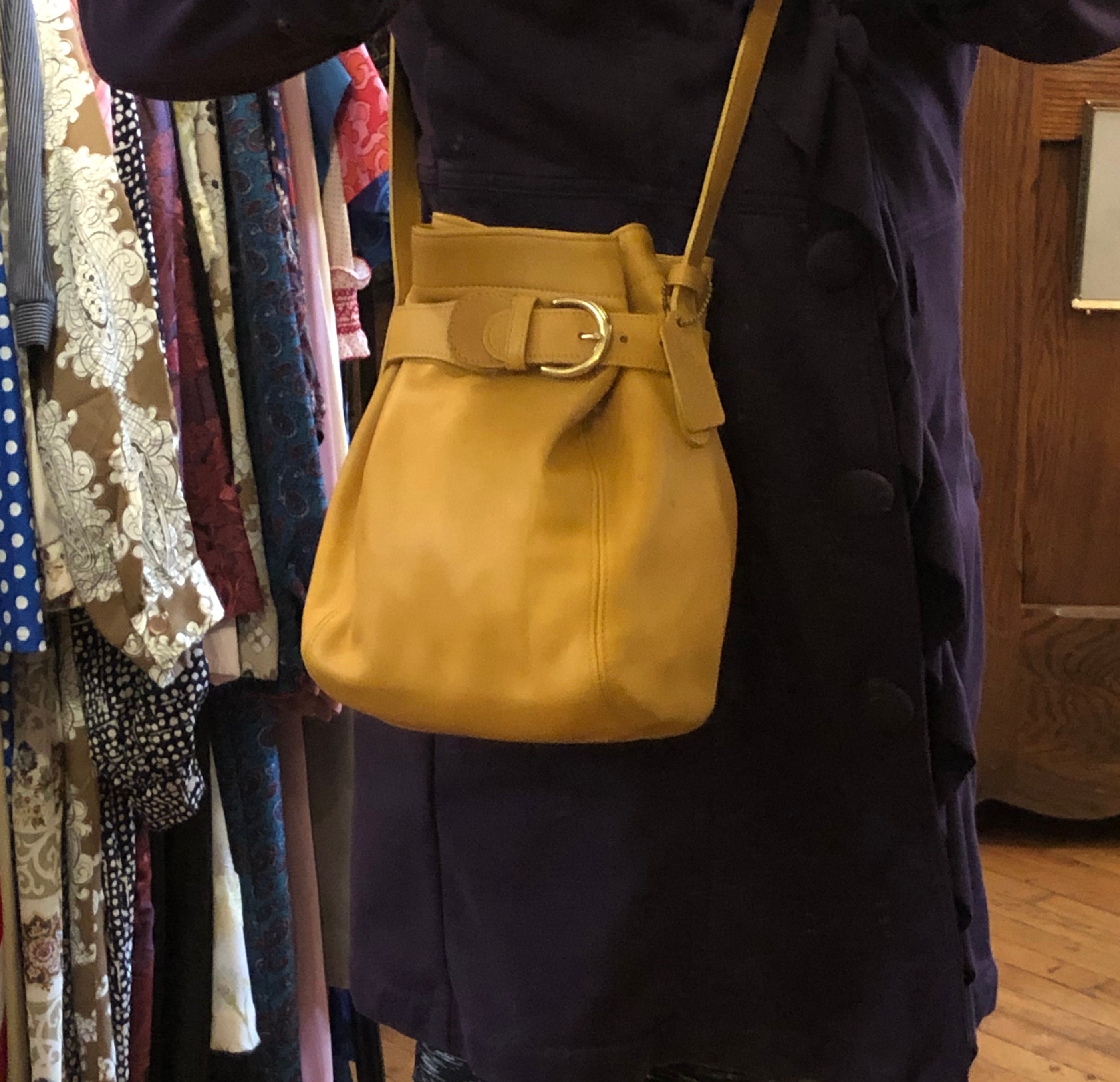 Mustard color coach purse sale