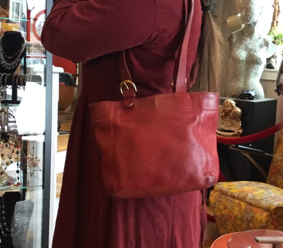 Red leather Coach purse.