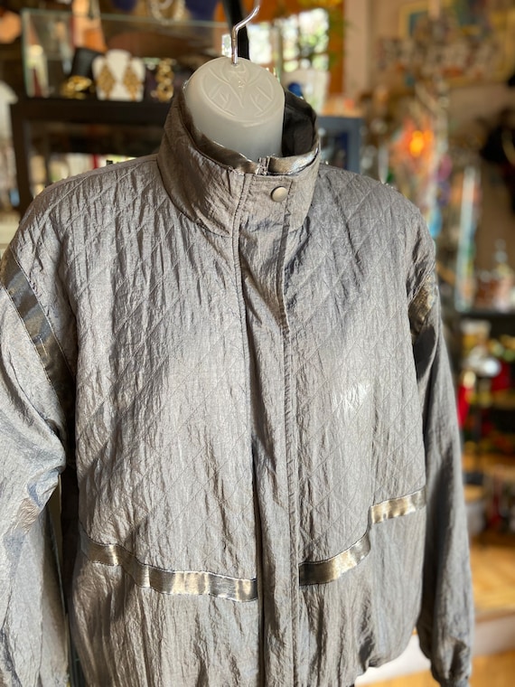 Metallic grey/silver shimmer windbreaker