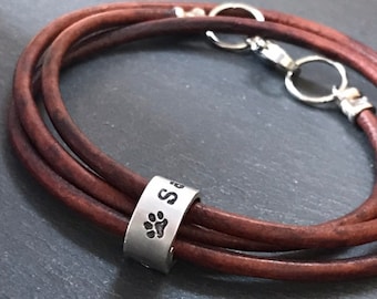 Personalized leather pet bracelet with ring charms with pawprint and custom name