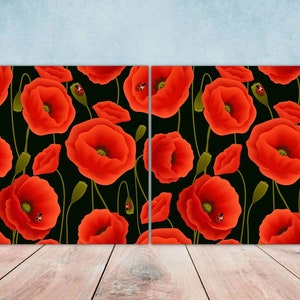 May include: A pair of square canvases with a black background and a repeating pattern of red poppies with ladybugs.