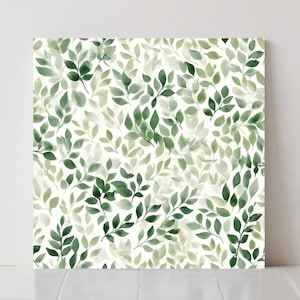 Può includere: Arte su tela quadrata con un motivo ad acquerello di foglie verdi su sfondo bianco. Le foglie variano in tonalità di verde, creando un'estetica naturale e rilassante. Ideale per aggiungere un tocco di natura a qualsiasi spazio.